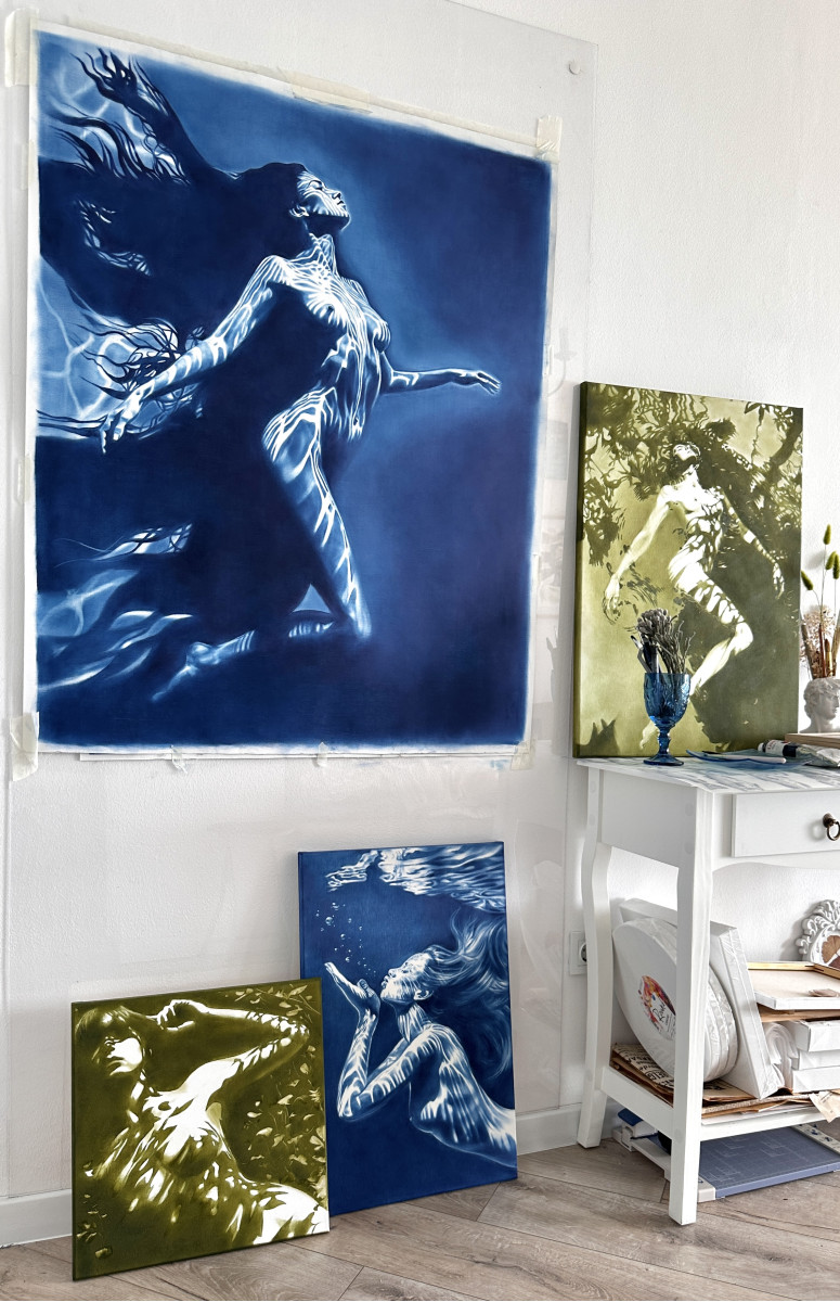 Carrying the Light – Underwater Female Nude in Deep Blue