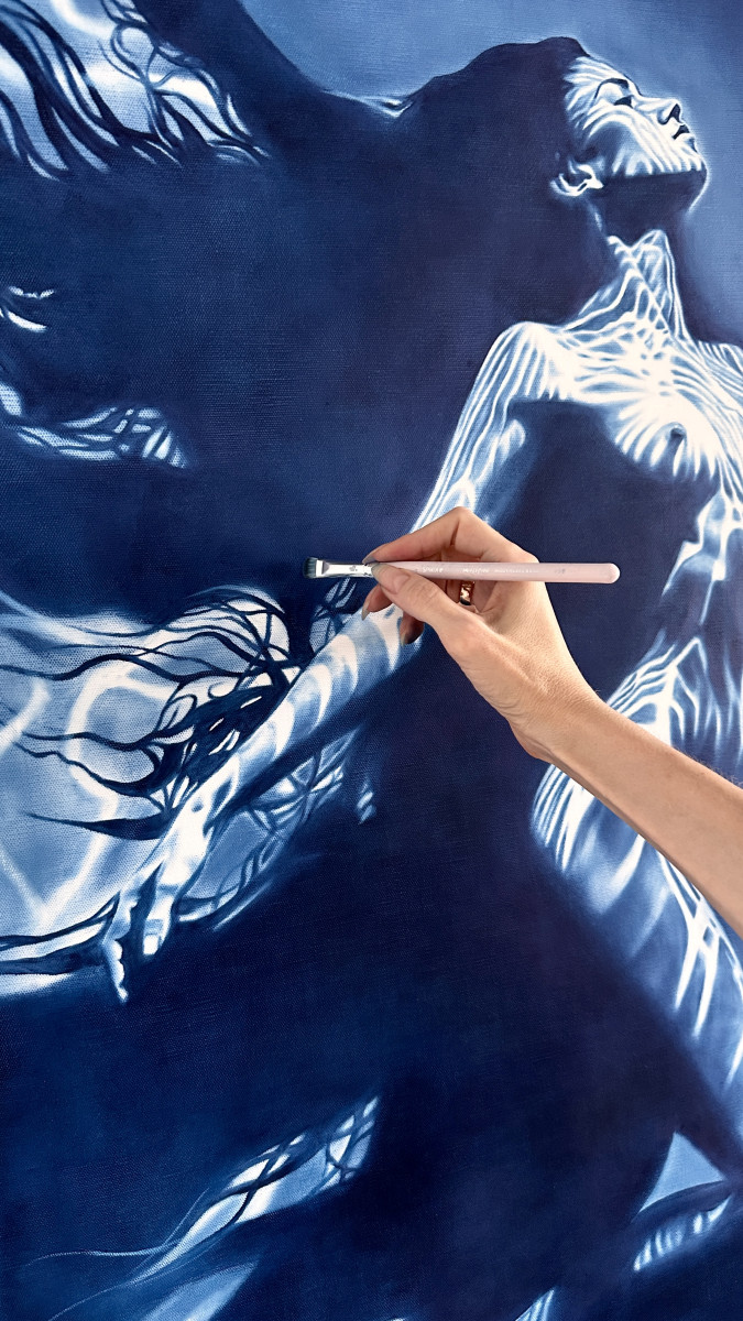 Carrying the Light – Underwater Female Nude in Deep Blue